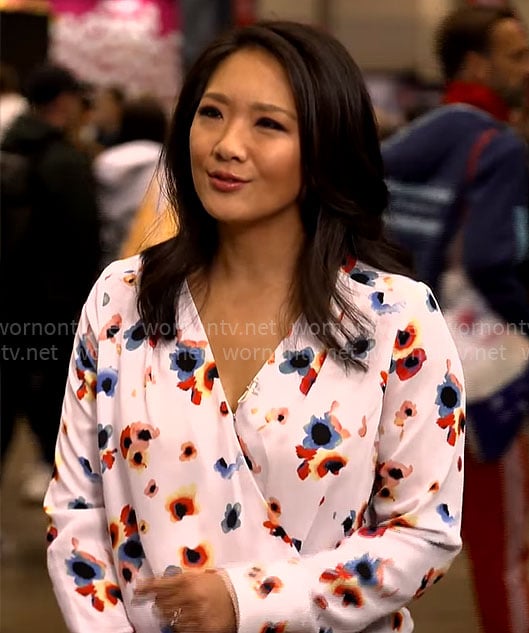 Nancy Chen’s white floral wrap blouse on CBS Saturday Morning