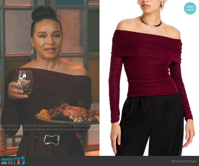 Ronny Kobo Harley Off The Shoulder Ruched Top in Oxblood worn by Kaya Blanke (Carra Patterson) on Elsbeth