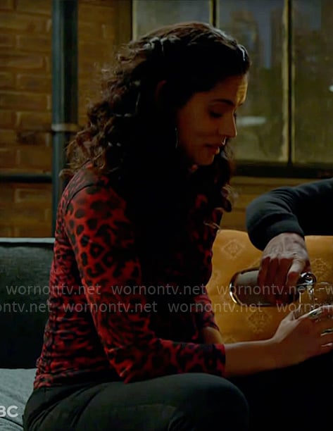 Stella’s red leopard print top on Chicago Fire