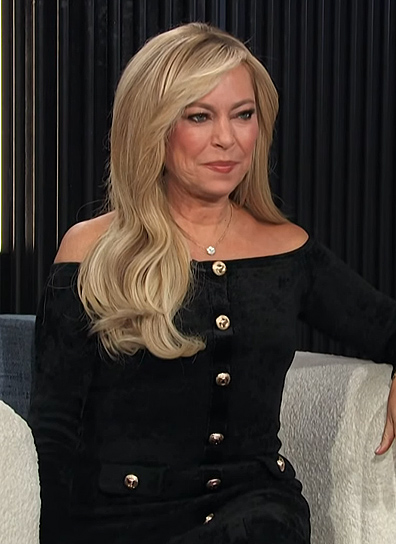 Sutton Stracke’s black button front dress on E! News