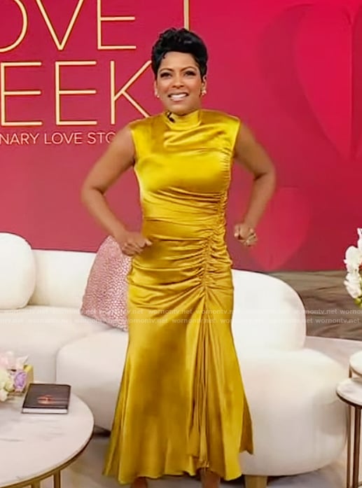 Tamron’s gold satin ruched front dress on Tamron Hall Show