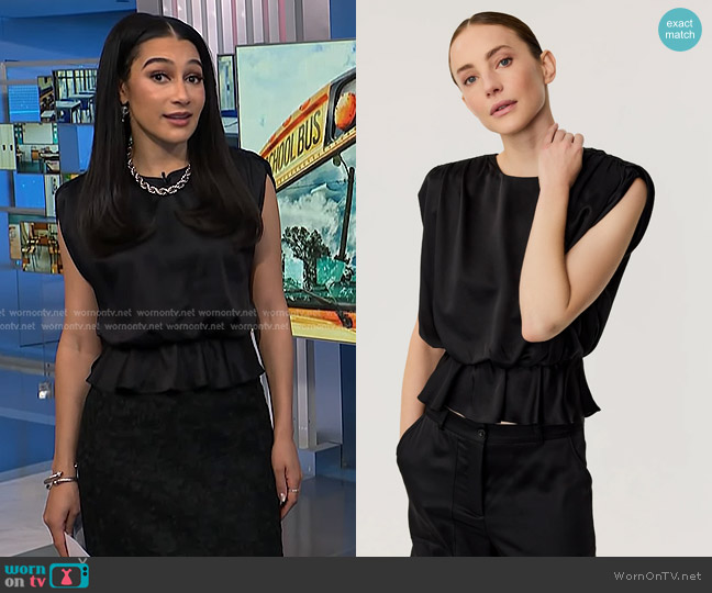 Toccin Saylor Peplum Blouse worn by Morgan Radford on NBC News Daily