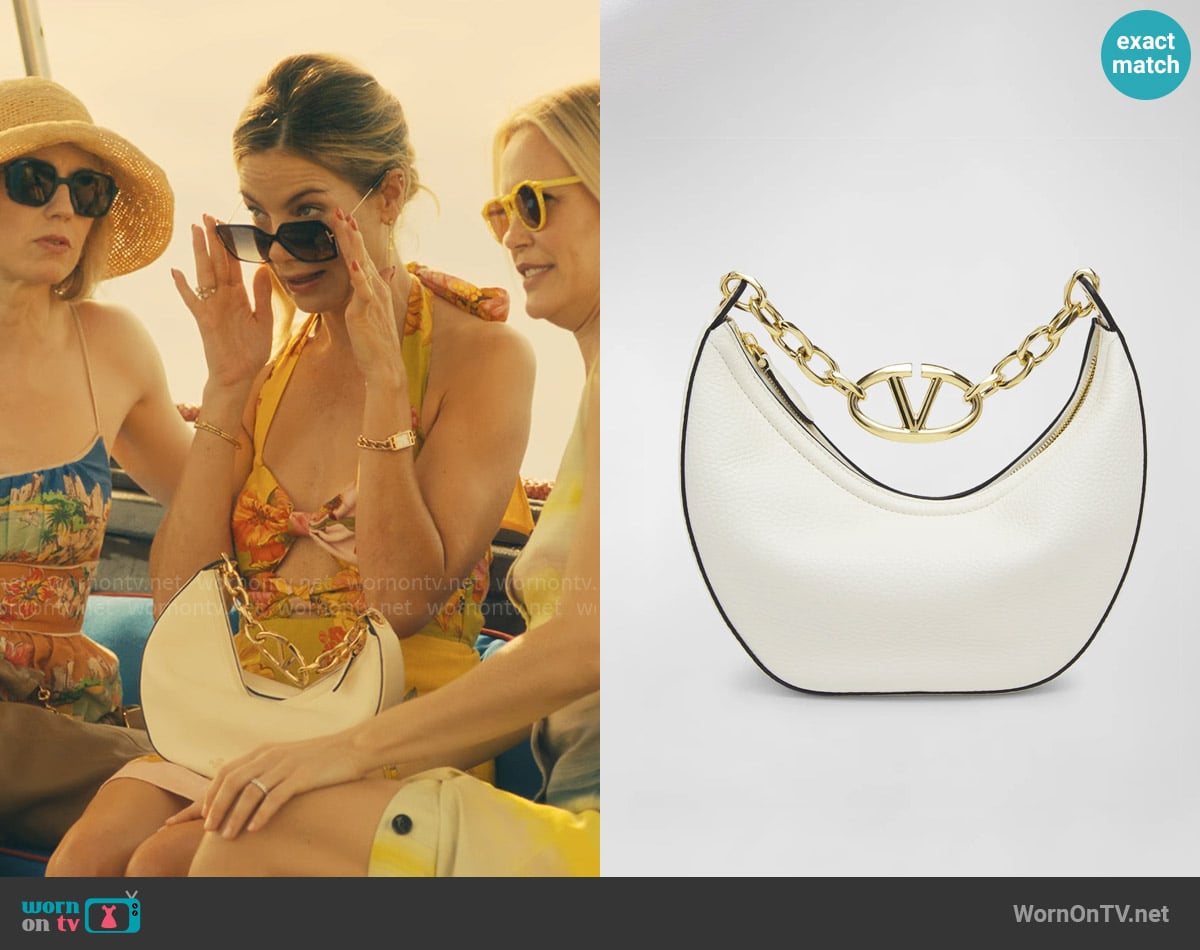 Valentino Garavani Small VLOGO Moon Hobo Bag worn by Jaclyn Lemon (Michelle Monaghan) on The White Lotus
