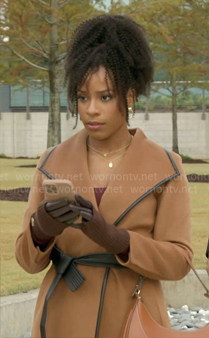 Naomi’s camel coat with leather trim on Beyond the Gates
