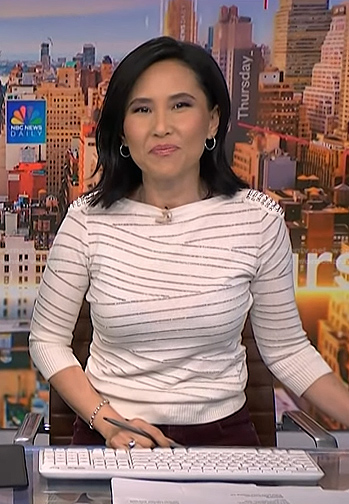 Vicky’s white stripe studded shoulder sweater on NBC News Daily