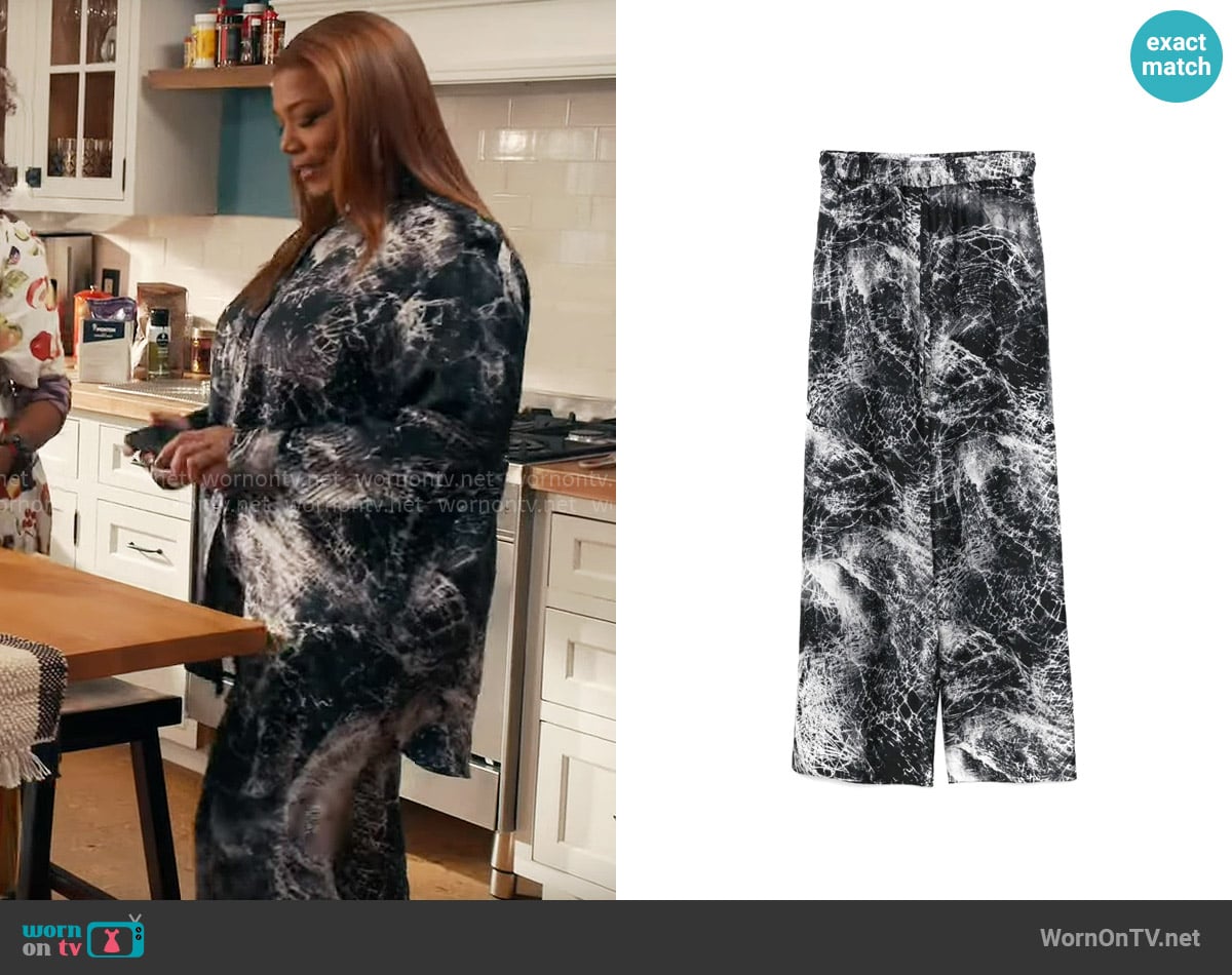 Alexander McQueen Abstract-print trousers worn by Robyn McCall (Queen Latifah) on The Equalizer