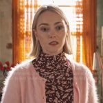 Alice’s burgundy floral mock-neck top and pink fluffy cardigan on Grosse Pointe Garden Society