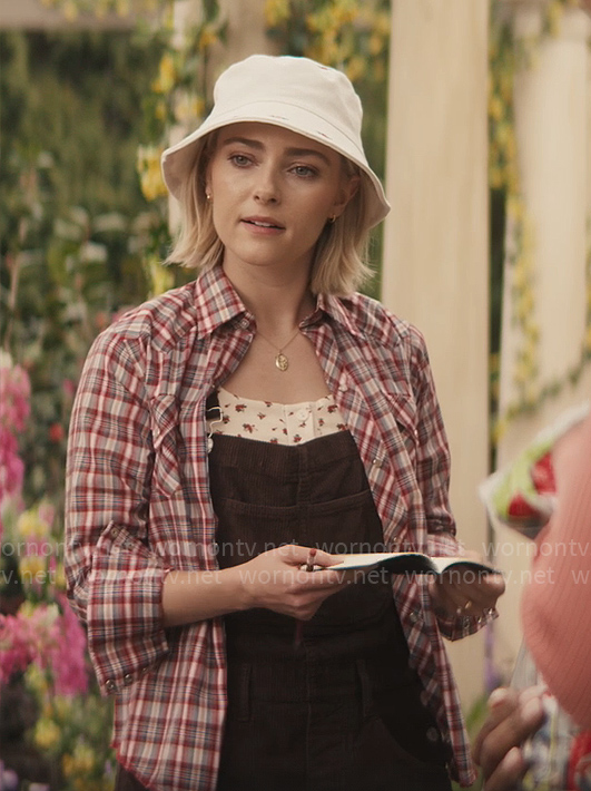 Alice’s black overalls and white floral embroidered bucket hat on Grosse Pointe Garden Society