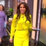 Alyssa’s yellow satin blouse and pants on The View
