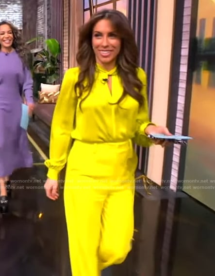 Alyssa’s yellow satin blouse and pants on The View