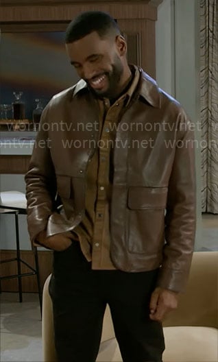Andre’s brown leather jacket on Beyond the Gates