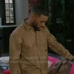 Andre’s beige denim shirt on Beyond the Gates
