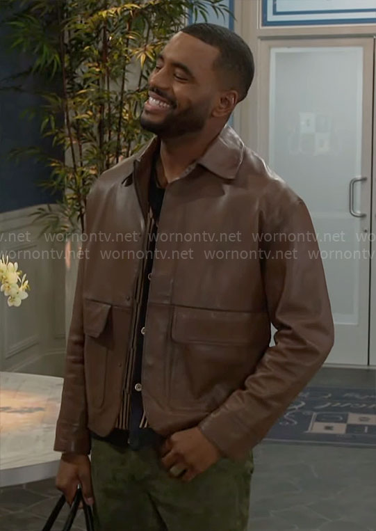 Andre’s brown leather jacket on Beyond the Gates