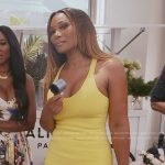 Angela’s yellow scoop neck dress on The Real Housewives of Atlanta
