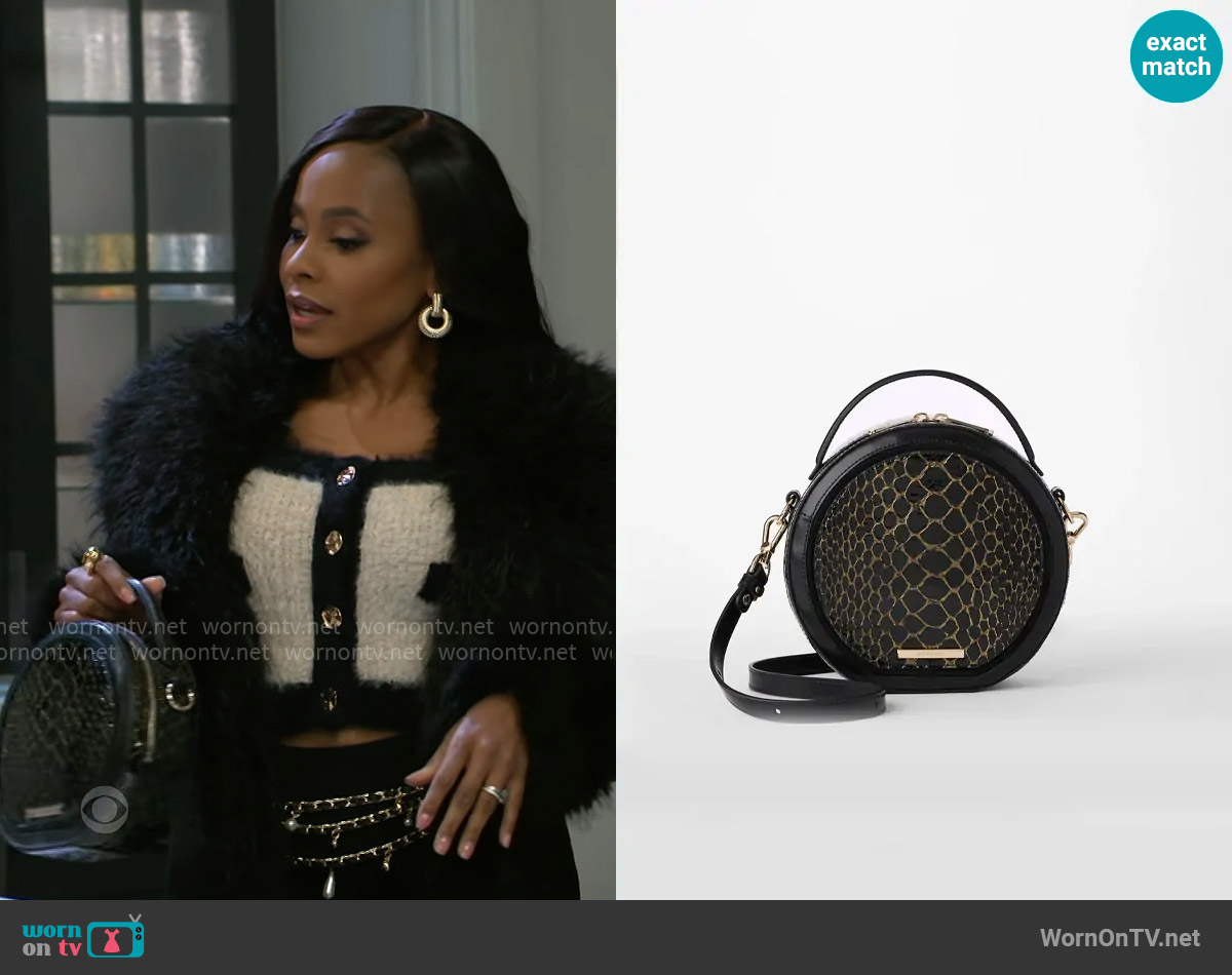 Brahmin Lane Bag in Black Cavatica worn by Hayley Lawson (Marquita Goings) on Beyond the Gates