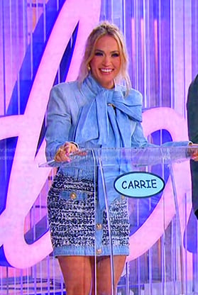 Carrie’s tie neck denim top and tweed mini skirt on American Idol