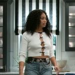 Chelsea’s white cutout top with bows and heart belt on Beyond the Gates