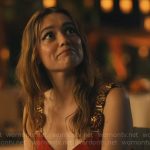 Chelsea’s red dress with gold and wood straps on The White Lotus