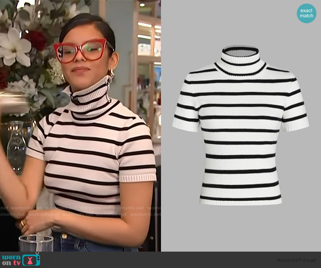 Cider Solid Turtleneck Knit Top worn by Lusiana Aguirre on Access Hollywood