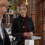 Claire’s black pearl button coat on The Young and the Restless