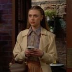 Claire’s printed button down blouse and pleated skirt on The Young and the Restless