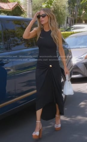 Dorit’s black sleeveless midi dress on The Real Housewives of Beverly Hills