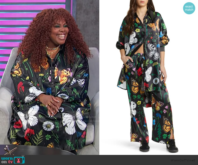Dressed in Lala Posh Floral Oversize Satin Button-Up Shirt and Pants Set worn by Amber Riley on Access Hollywood