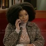 Eva’s animal print sweater and jacket on Beyond the Gates