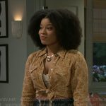 Eva’s yellow floral button down shirt and embroidered mini skirt on Beyond the Gates