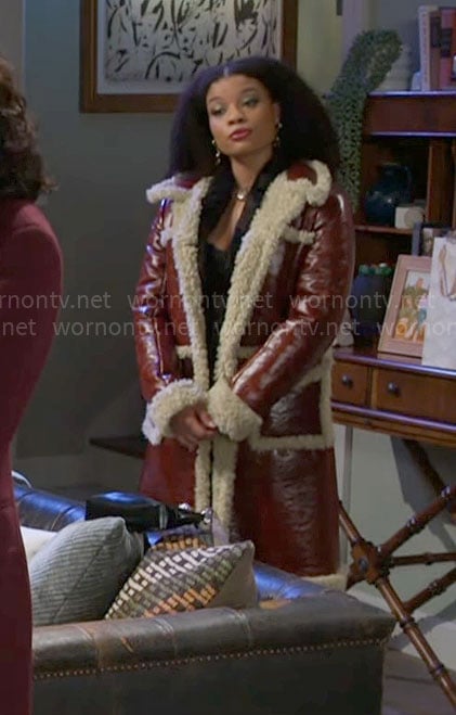 Eva’s leather coat with sherpa trims on Beyond the Gates
