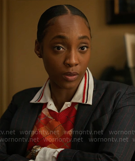 Faith’s striped collar shirt and red argyle sweater vest on Will Trent