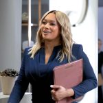 Fatima’s navy split-neck sheath dress on Tyler Perrys Sistas