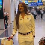Garcelle’s white stripe track jacket and pants on The Real Housewives of Beverly Hills