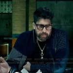 Harry’s navy patchwork cardigan on The Equalizer