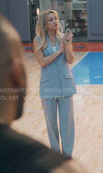 Isla’s grey vest suit on Running Point