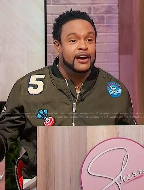 Jawn’s green patch bomber jacket on Sherri