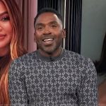 Justin’s gray logo print sweater on E! News
