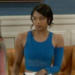 Kat’s blue asymmetric crop top on Beyond the Gates