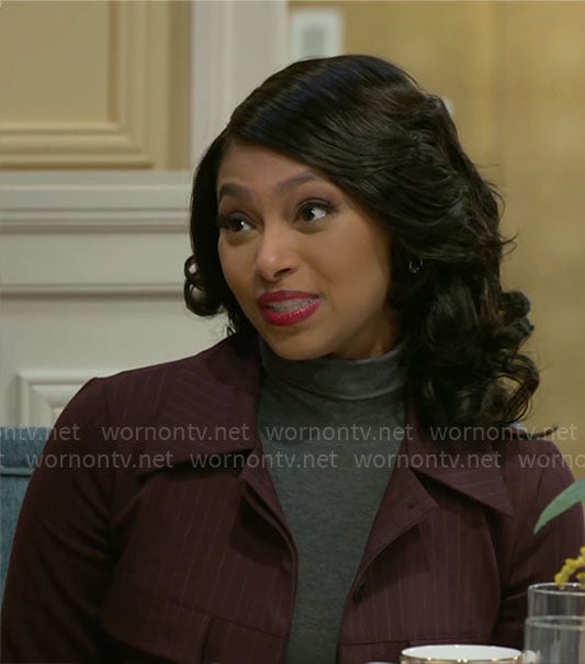 Kat’s burgundy pinstripe jacket and skirt on Beyond the Gates