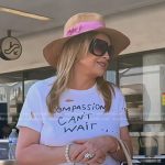 Kathy’s distressed graphic print tee and straw hat on The Real Housewives of Beverly Hills
