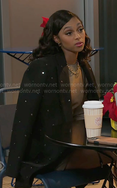 Kat’s black studded coat on Beyond the Gates