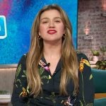 Kelly’s black floral print wrap blouse on The Kelly Clarkson Show