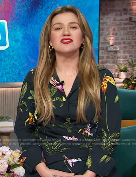 Kelly’s black floral print wrap blouse on The Kelly Clarkson Show