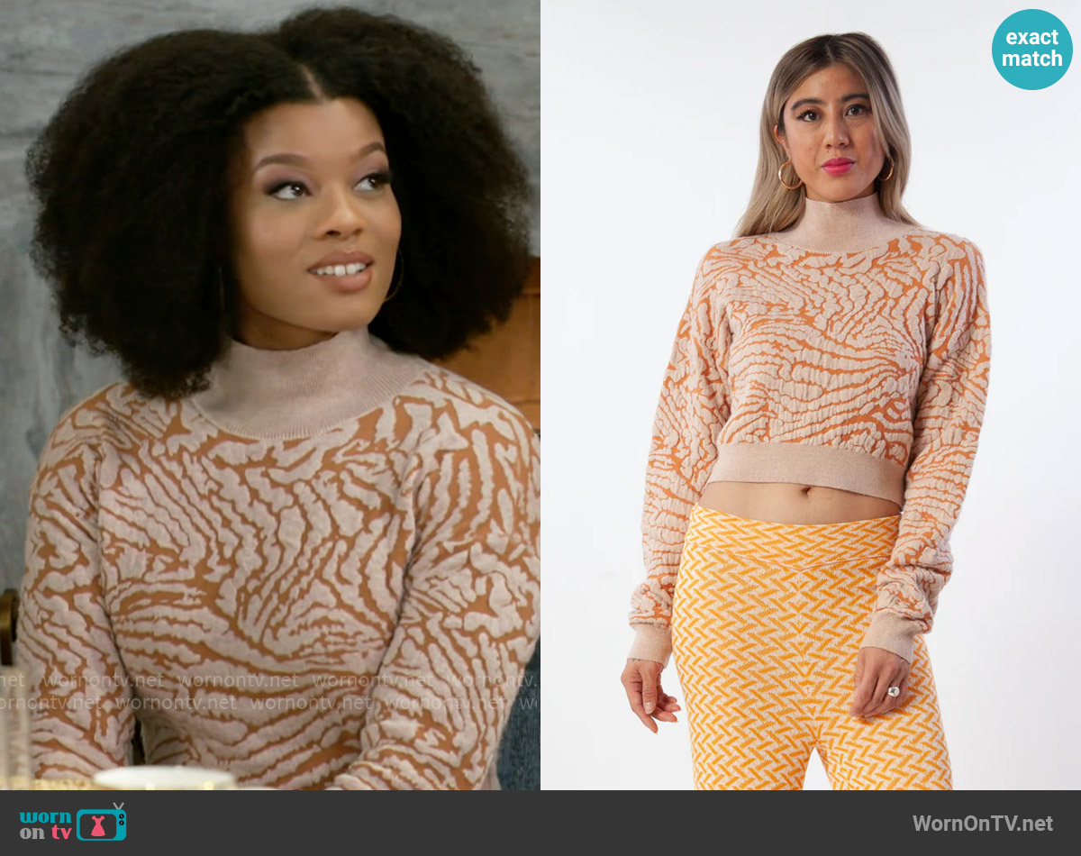 Kerisma Tyga Sweater in Sandstone worn by Eva Thomas (Ambyr Michelle) on Beyond the Gates