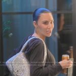 Kim’s silver metallic shoulder bag on The Kardashians
