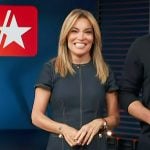 Kit’s denim pleated mini dress on Access Hollywood