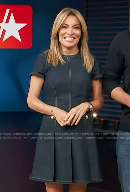 Kit’s denim pleated mini dress on Access Hollywood