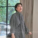Kris’s black polka dot tie neck blouse on The Kardashians