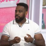 Lamar Waterman’s white polo shirt on Today