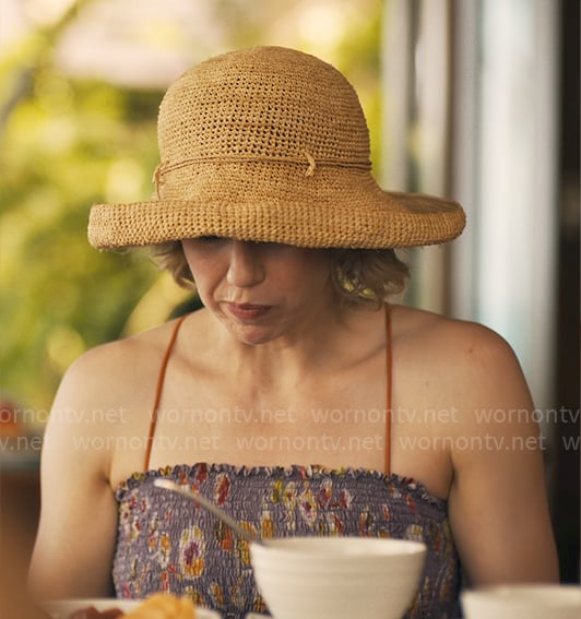 Laurie’s strapless smocked dress and raffia hat on The White Lotus